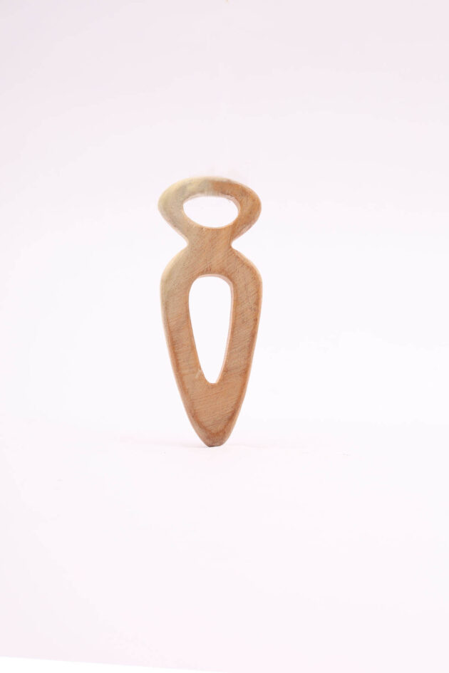 An image of the Wooden Carrot-Shaped Teether for babies by Bumshum, a nature-friendly store for kids. The teether is crafted from 100% natural wood and is shaped like a carrot, featuring various textures and an elegant, eco-friendly design.