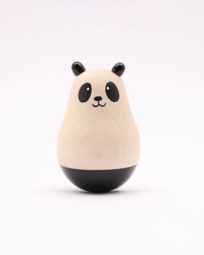 An image of the Wooden Roly Poly Panda for babies by Bumshum, a nature-friendly store for kids. This charming panda-shaped toy is made from natural wood and designed for sensory engagement, adding a touch of eco-friendly playfulness to your baby's playtime