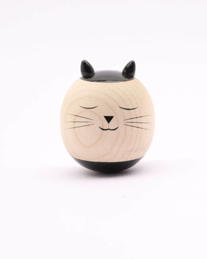 An image of the Wooden Roly Poly Toy with a friendly cat face for babies by Bumshum, a nature-friendly store for kids. The toy is made from natural wood and designed for sensory engagement and imaginative play.